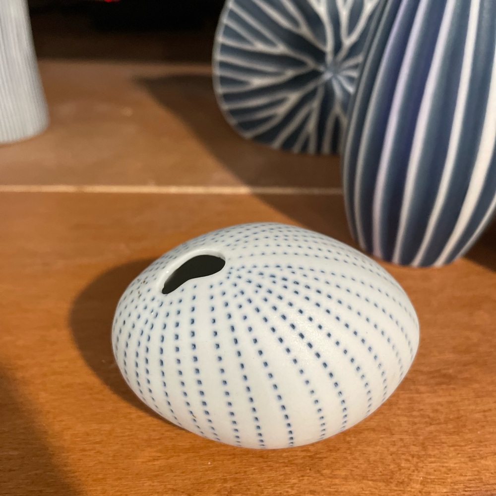 Kaolinite vase 
White and Blue Ceramic Sea Urchin Vase